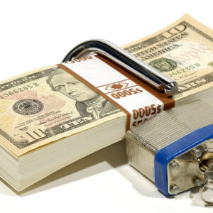 Image of a stack of money with a lock around it