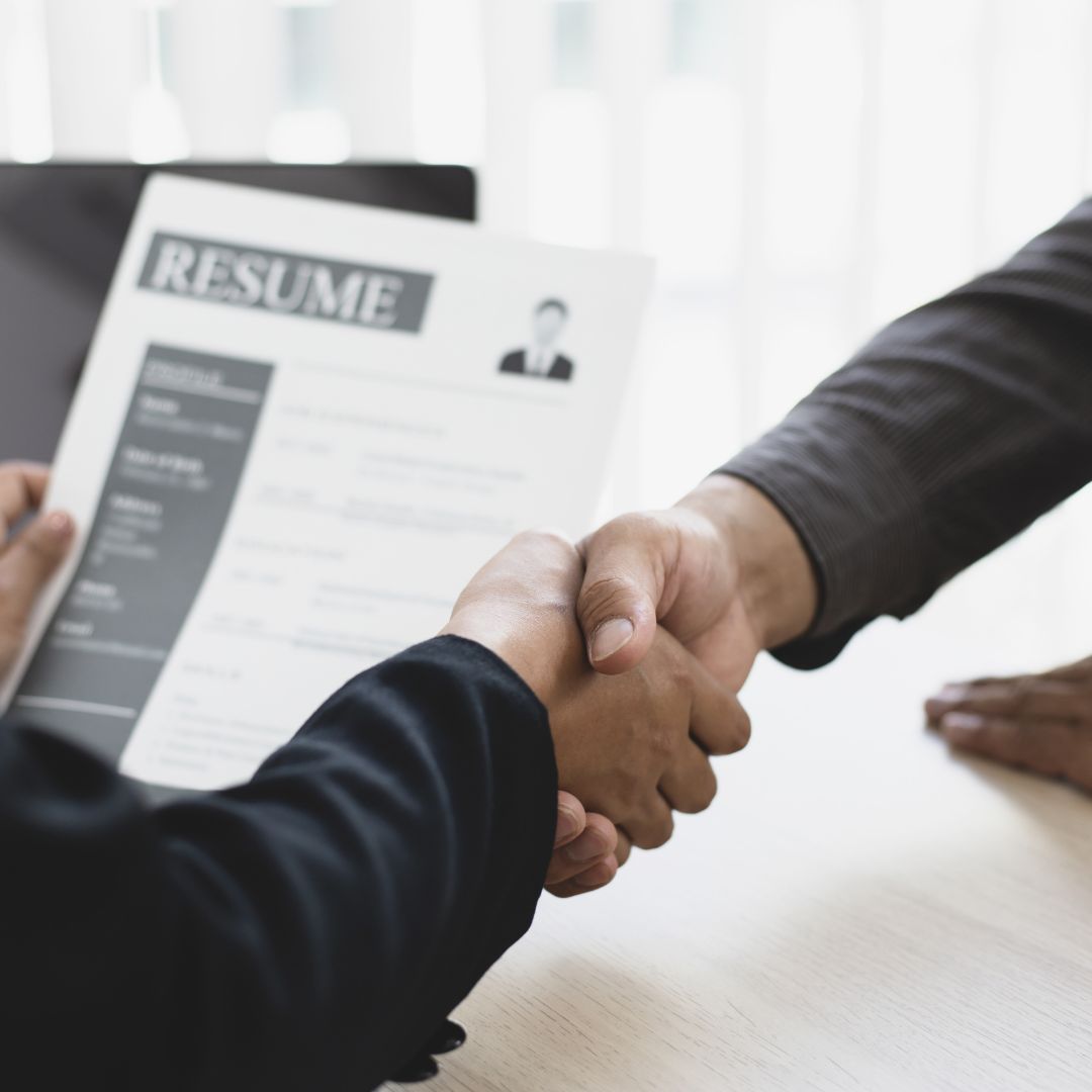 shaking hands at a job interview