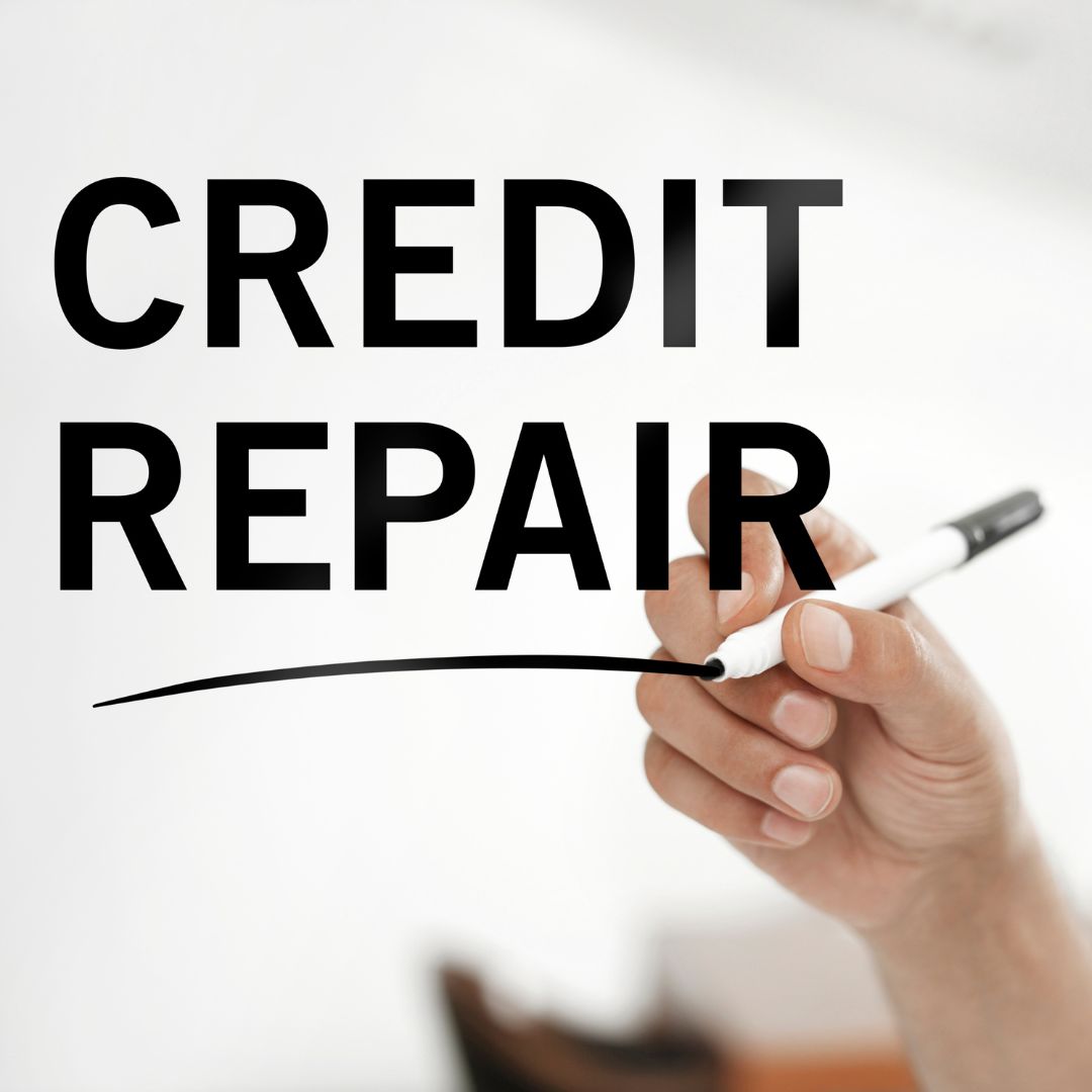 person writing Credit Repair on screen