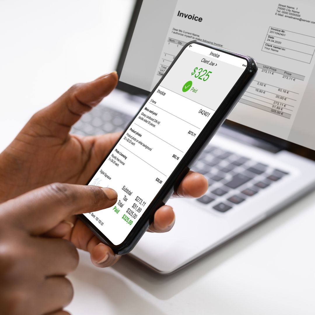a person looking at an invoice on a phone