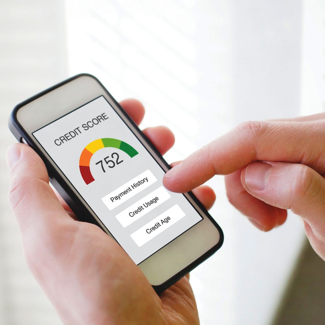 a person looking at their credit score on a phone