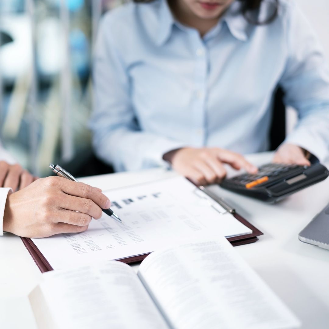people reviewing paperwork