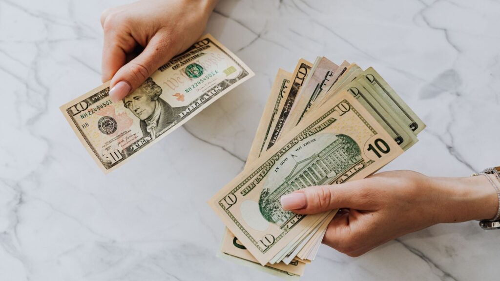 person counting cash